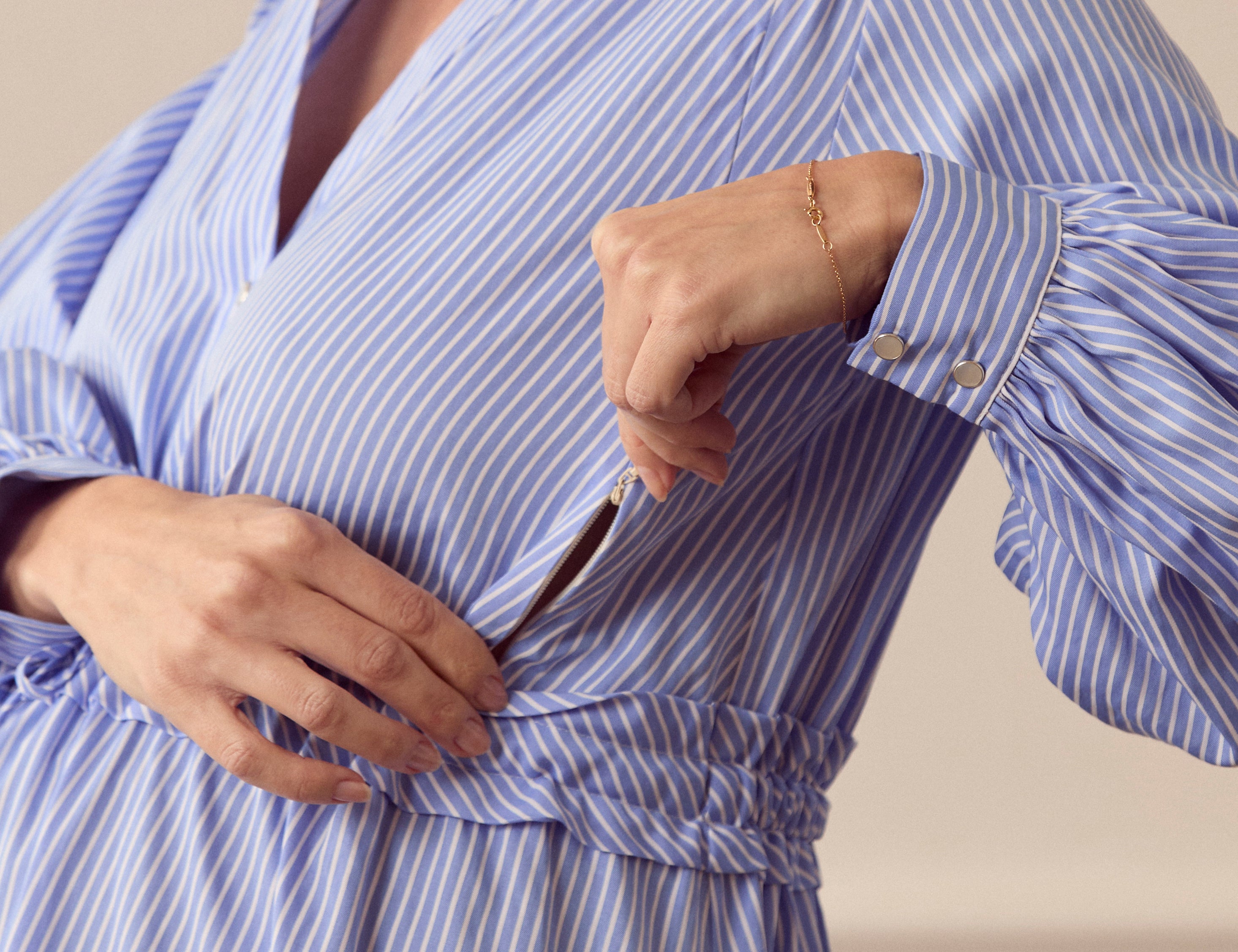 pregnant women wearing pin stripe breastfeeding dress