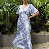Model wearing Rewritten Ellis Dress in Blue Lily Print
