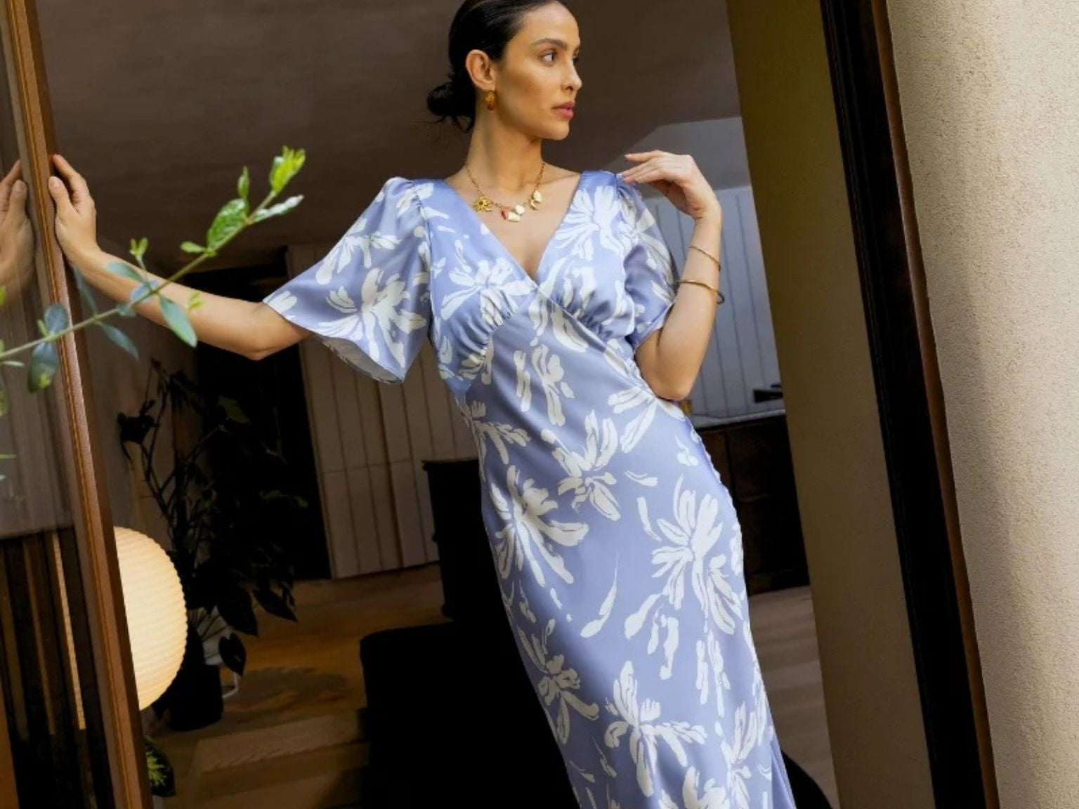 Model wearing Rewritten Ellis Dress in Blue Lily Print