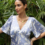 Model wearing Rewritten Ellis Dress in Blue Lily Print