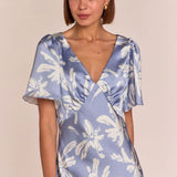 Model wearing Rewritten Ellis Dress in Blue Lily Print