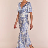 Model wearing Rewritten Ellis Dress in Blue Lily Print