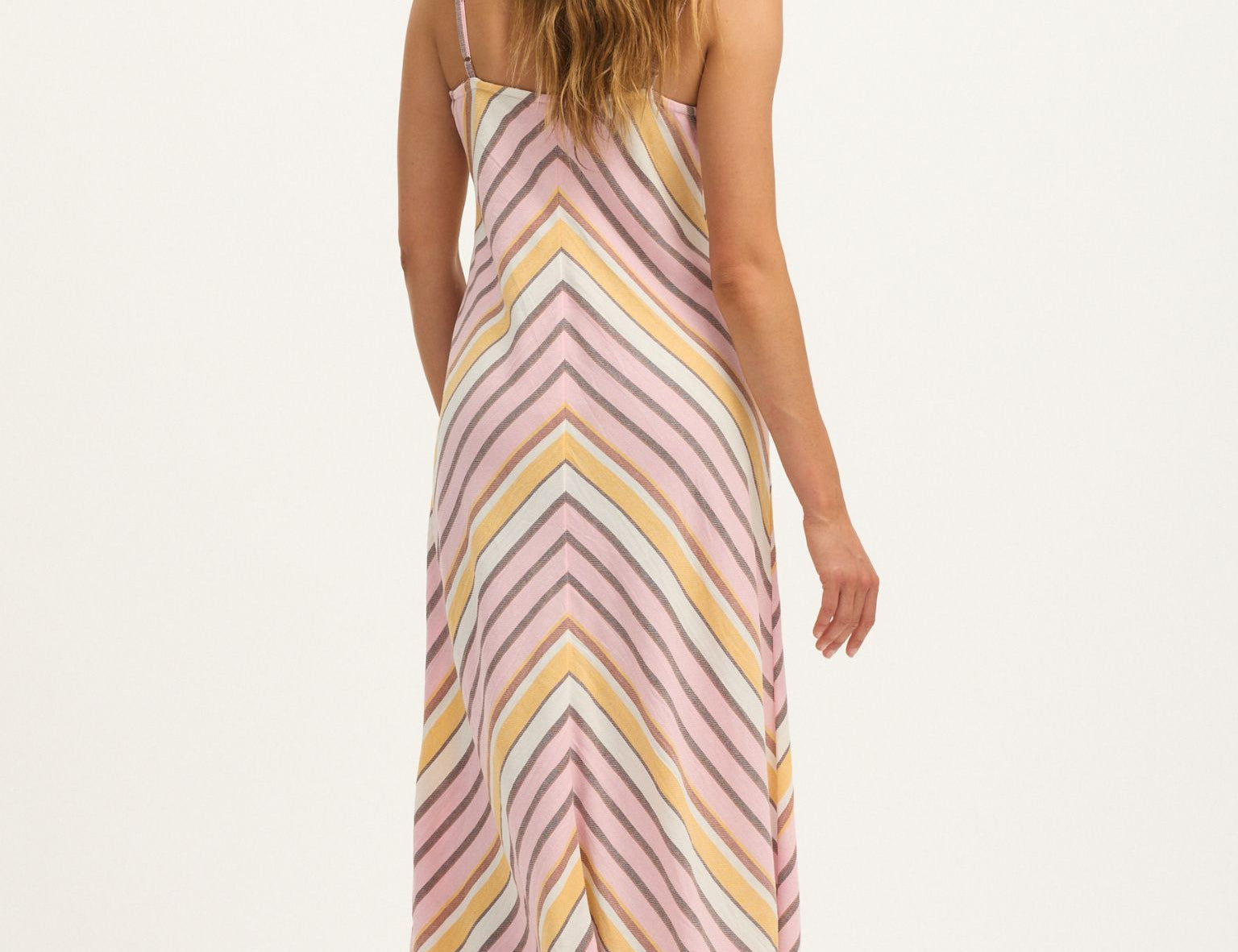 Model wearing Summery Copenhagen Martha Strap Midi Dress in Pink Mist – full back view