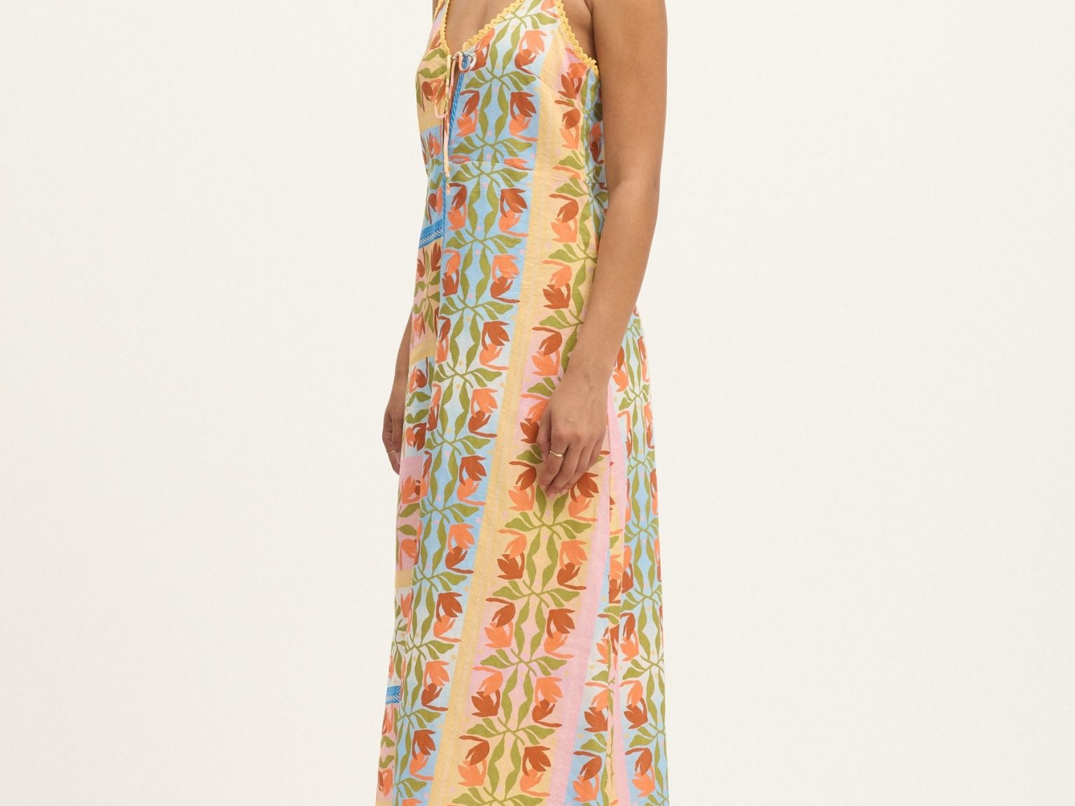 Side view of Summery Copenhagen Carmen String Dress in Multi Colour with tie-front and spaghetti straps