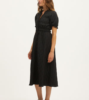 Model wearing Summery Copenhagen Karen Midi Dress in Black – side view