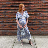Pregnant Model wearing Rewritten Ellis Dress in Blue Lily Print