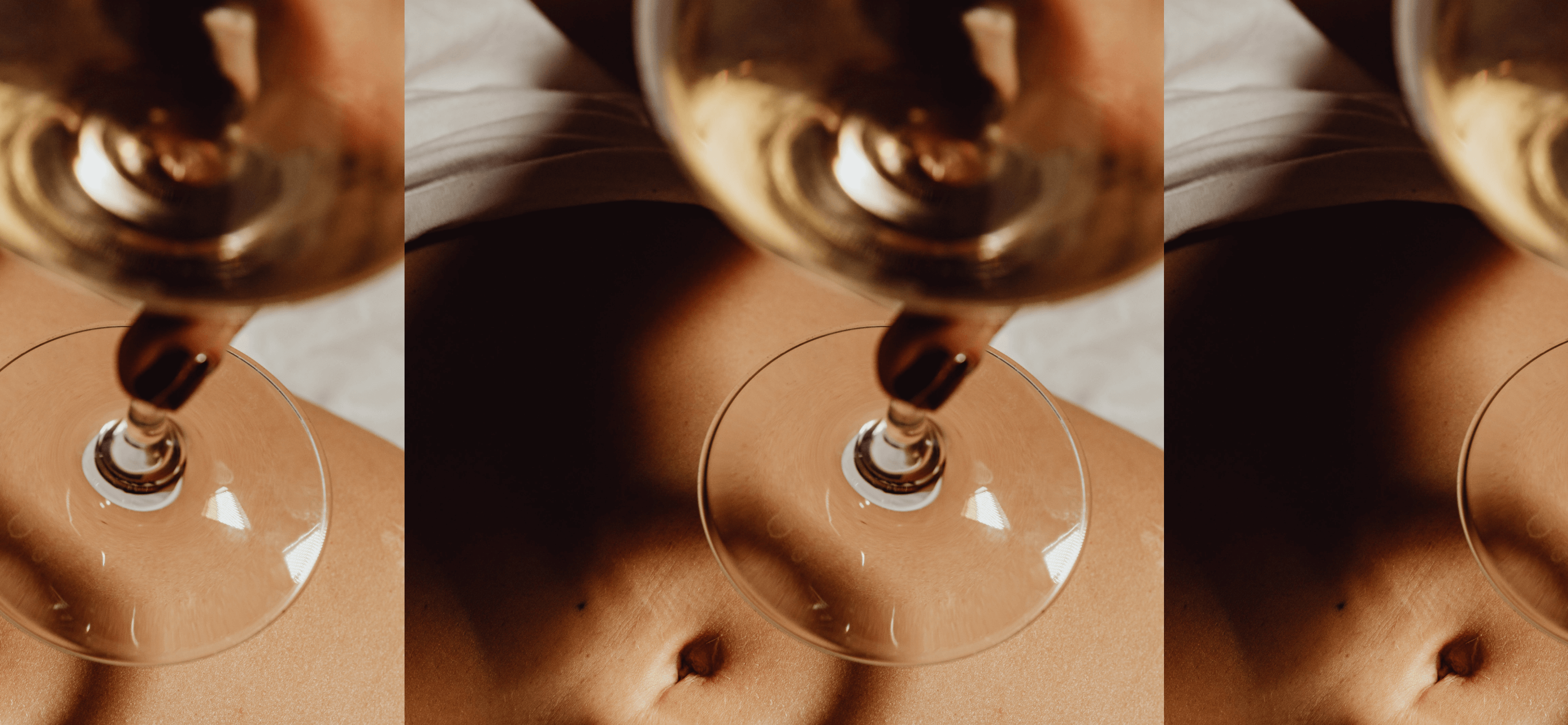 A woman holding a glass of wine