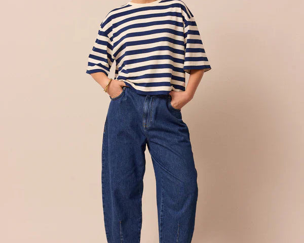 early pregnant woman wearing beyond nine maternity jeans