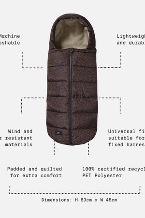 A brown and black patterned quilted winter balaclava shown on a light gray background with text callouts describing its features, including machine washable, lightweight and durable, wind and water resistant materials, padded and quilted, and 100% certified recycled PET Polyester.