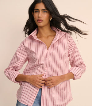 Woman wearing pink stripe shirt