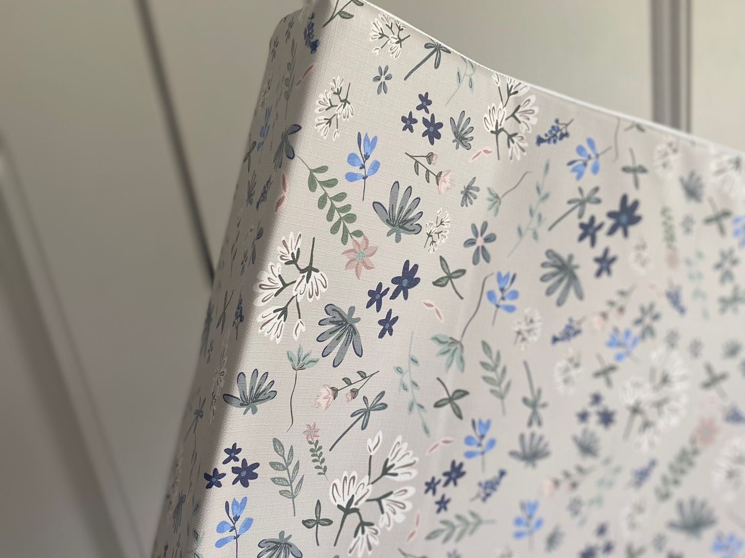 Floral patterned paper with 'Ralphie Bear' branding on a white background