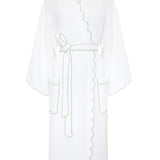 A white textured bathrobe with scalloped edges and a matching tie belt, shown against a plain white background.