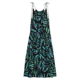 Long dress with green leaf pattern on a white background