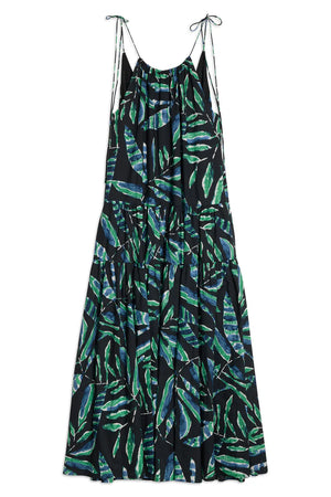 Long dress with green leaf pattern on a white background