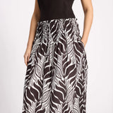 Zebra print pants worn by a person on a white background