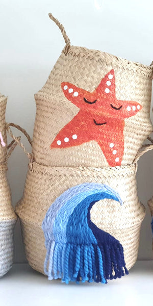 Shell belly basket, large, stacked with five other sea-creature baskets including jellyfish, starfish, crab and wave