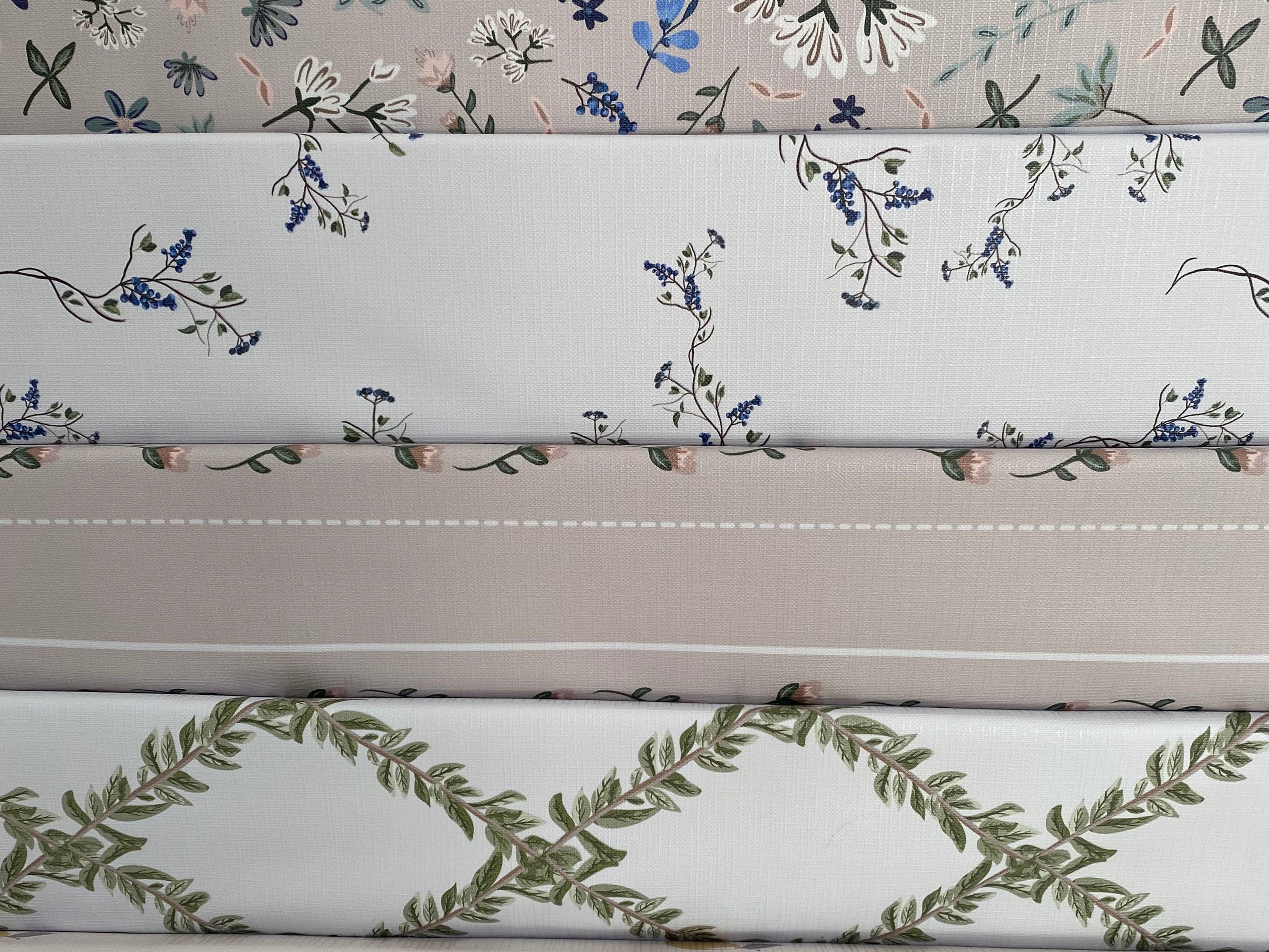 Floral patterned paper with 'Ralphie Bear' branding on a white background