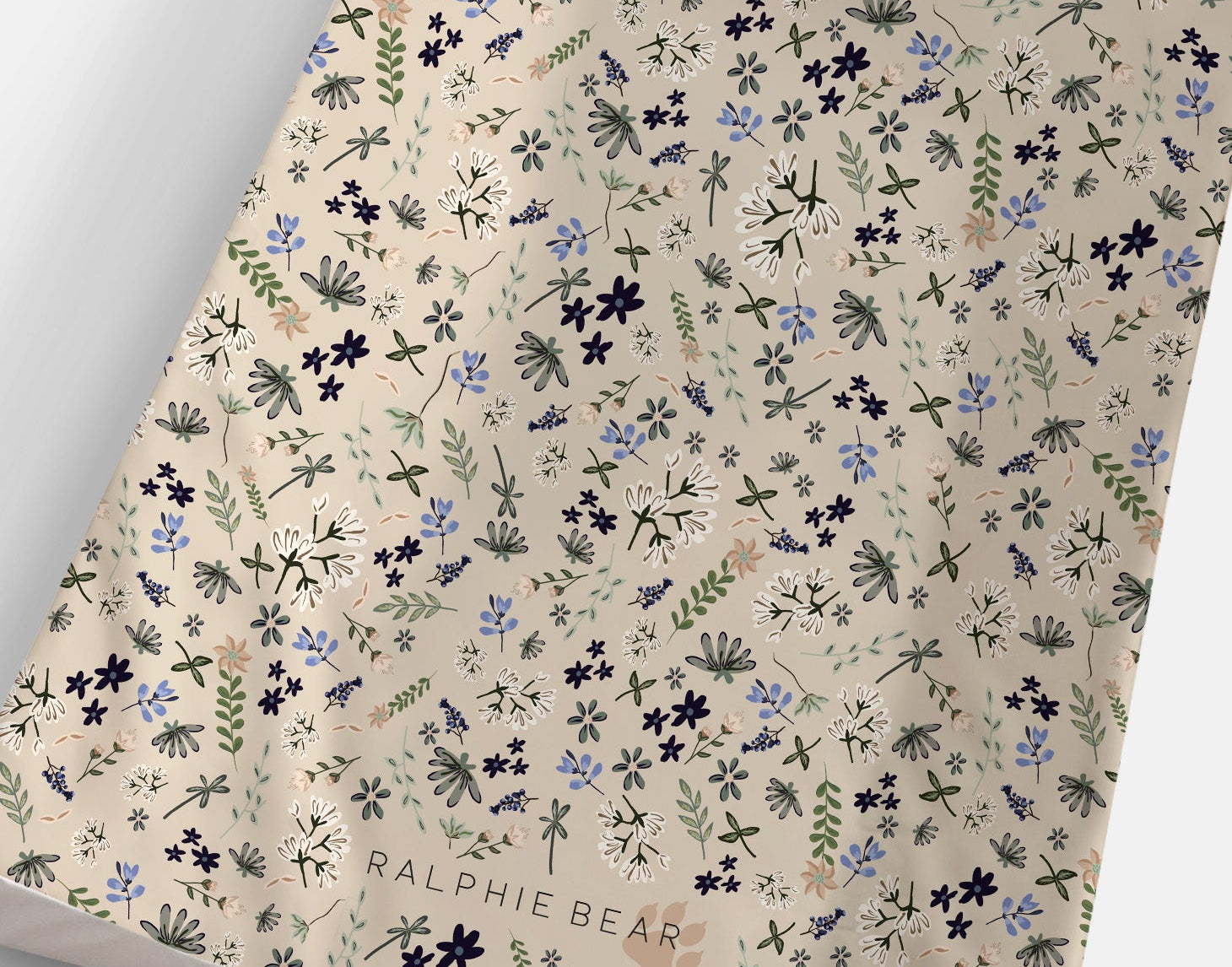 Floral patterned paper with 'Ralphie Bear' branding on a white background