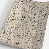 Floral patterned paper with 'Ralphie Bear' branding on a white background