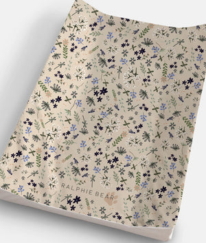 Floral patterned paper with 'Ralphie Bear' branding on a white background