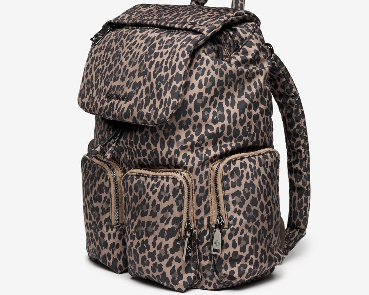 Leopard print backpack on a white background