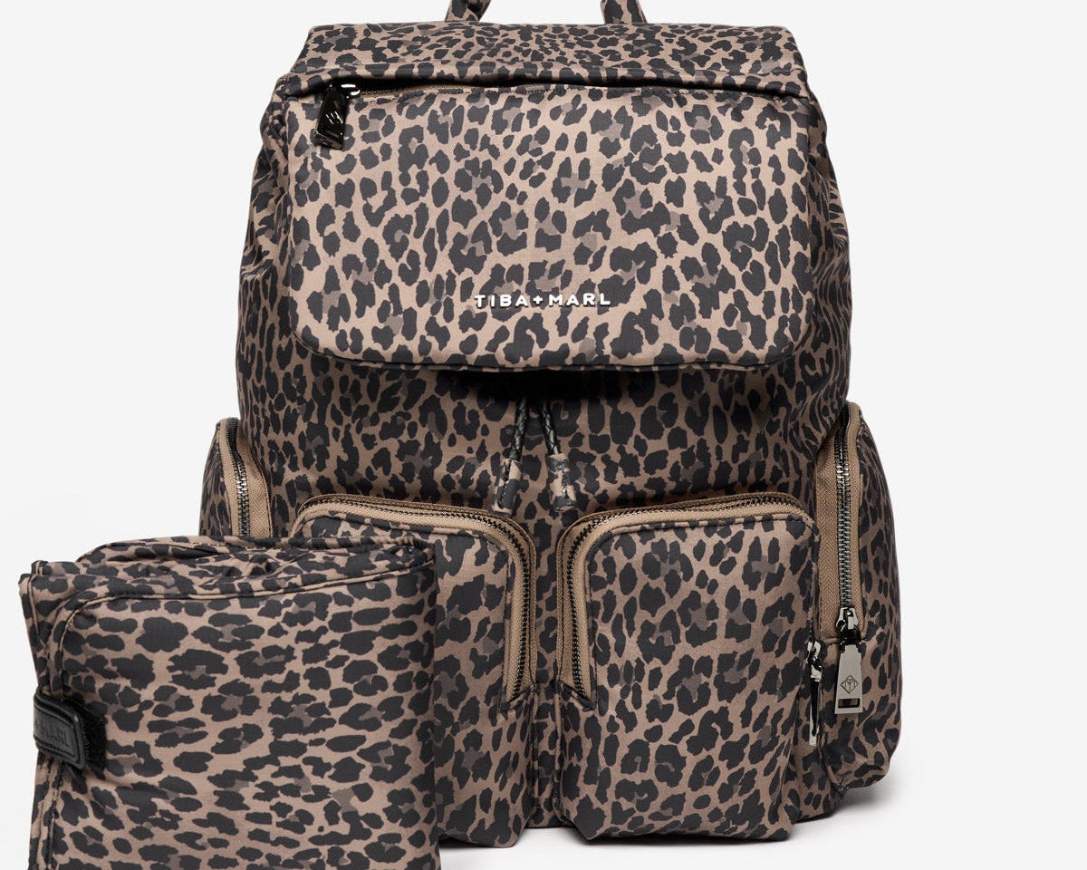 Leopard print backpack and pouch set on a white background