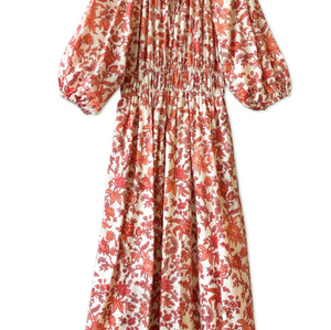 Albaray cream midi dress with orange botanical print, made from 100% organic cotton. Features a gathered tie neckline, ¾ sleeves, elasticated waist, and lined skirt with pockets – ideal for everyday comfort and effortless style.