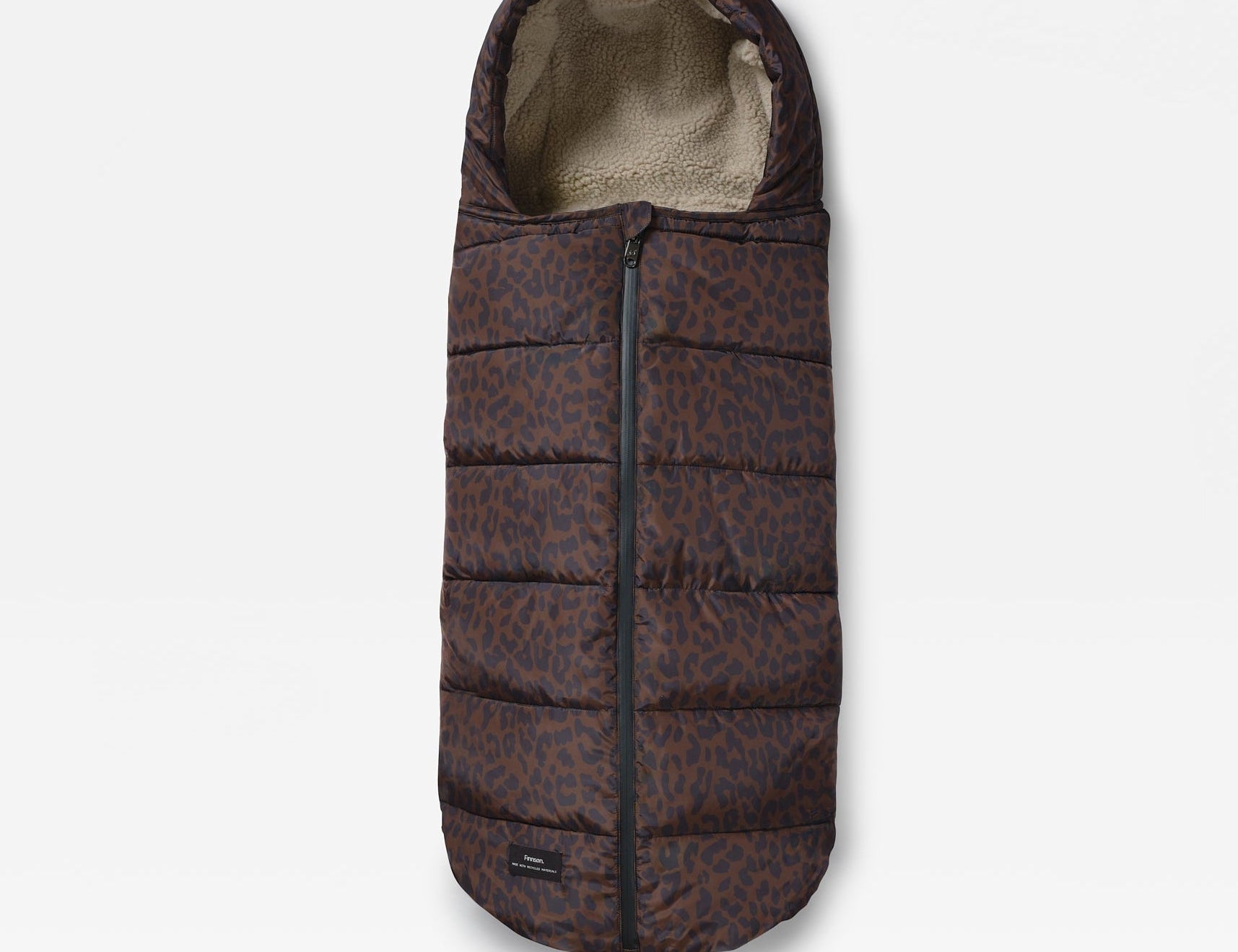 A puffer footmuff in a dark brown and black leopard print pattern, featuring a beige fleece lining visible at the opening, shown against a light gray background.