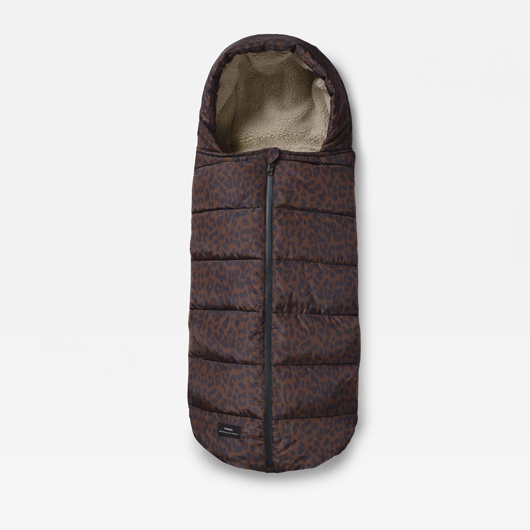 A puffer footmuff in a dark brown and black leopard print pattern, featuring a beige fleece lining visible at the opening, shown against a light gray background.