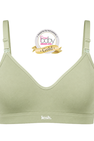 A sage green wireless baby bra by lesh. on a white background, featuring a 'Best baby Awards 2023 Gold' badge overlay near the neckline.