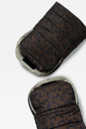 Inside of the Astrid stroller mittens in Chocolate Leopard, showing the cream fleece lining and hand strap