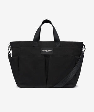 Black bag with a visible brand label on a white background