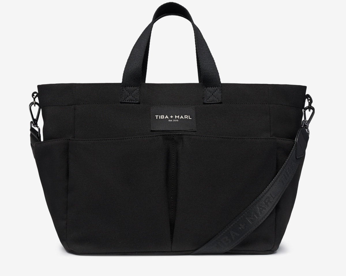 Black bag with a visible brand label on a white background