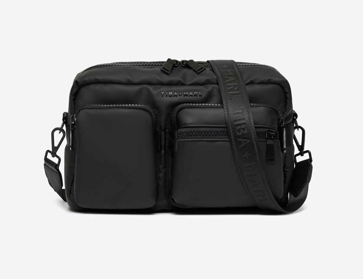 Black crossbody bag on a white background