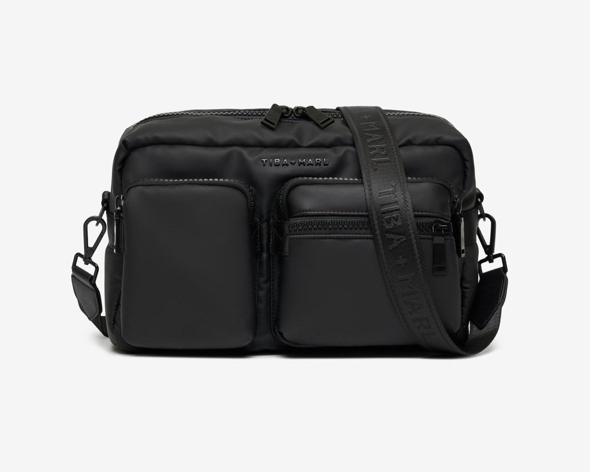 Black crossbody bag on a white background