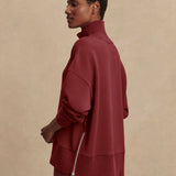 Model wearing Varley Barker high-neck oversized sweatshirt in soft DoubleSoft® fabric.