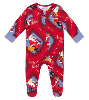 A baby's long-sleeve footed sleeper with a festive Christmas print featuring Santa Claus, set against a plain white background.