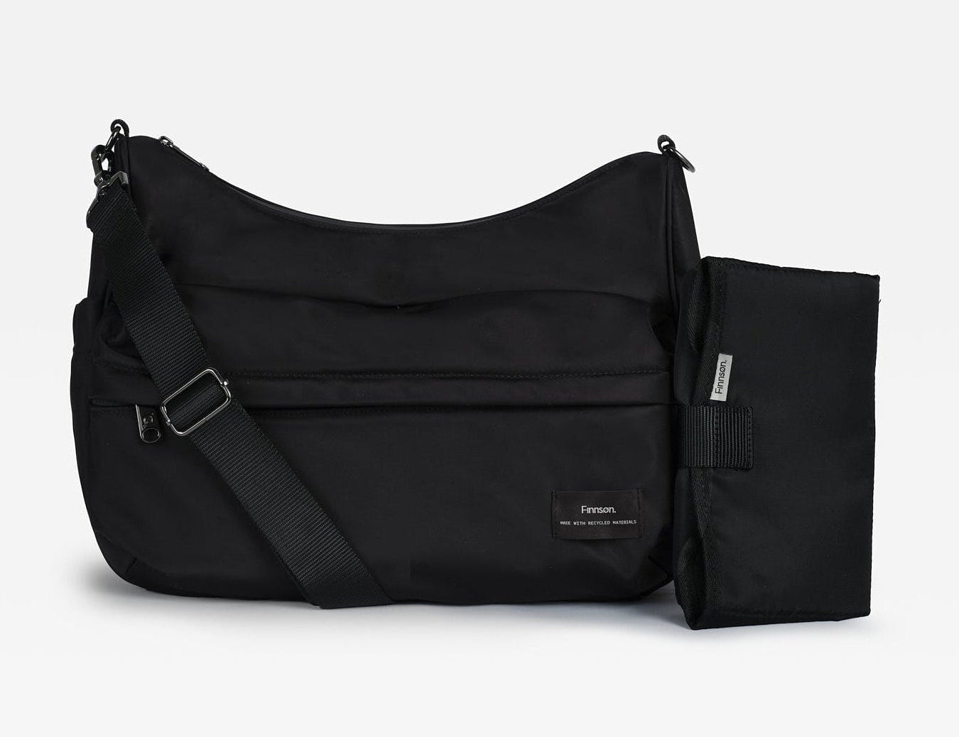 A black nylon shoulder bag with an adjustable shoulder strap and a matching zippered pouch attachment, shown on a light gray background.