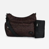 Clara Eco Changing Bag, Chocolate Leopard, front view with crossbody strap and black changing mat beside it