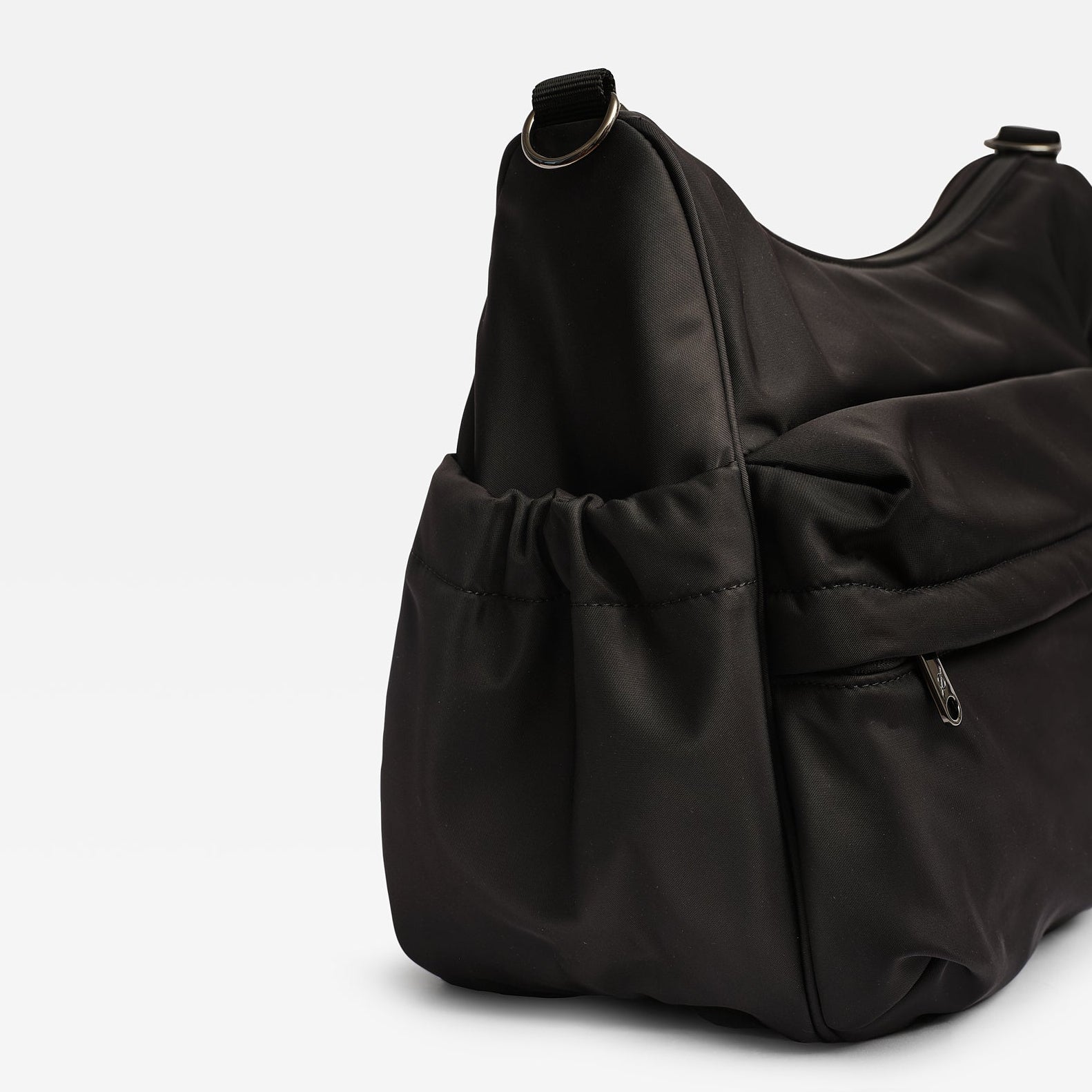 A black nylon hobo bag with a drawstring front pocket and a zippered side pocket, shown on a clean white background.