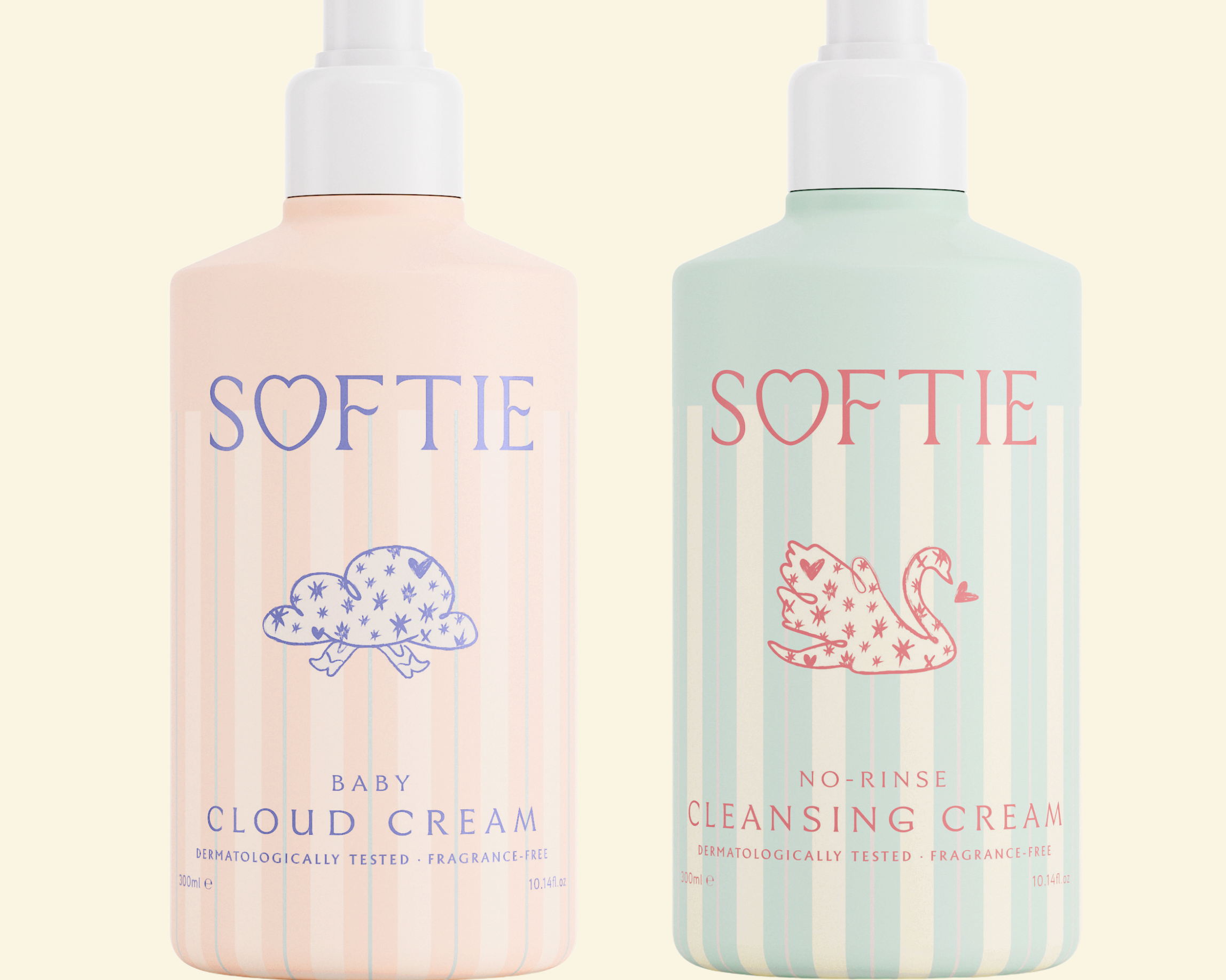 Two bottles of SOFTIE baby products on a light beige background