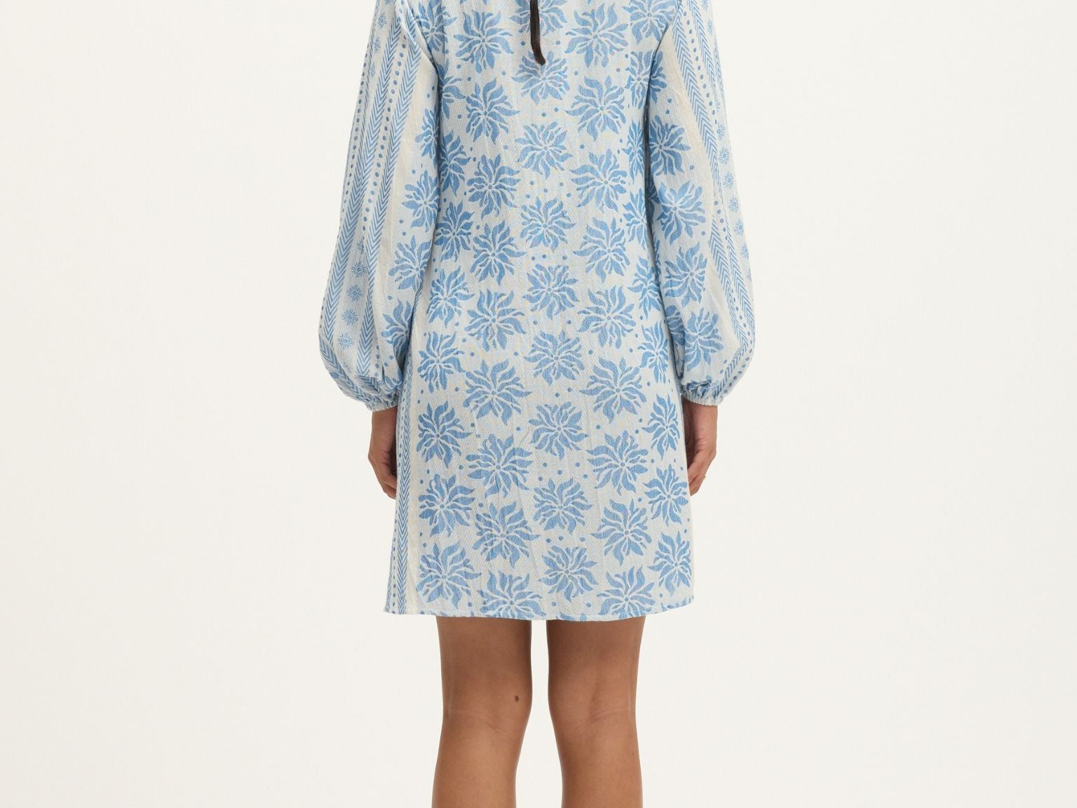 Back view of the Deborah Waffle Mini Dress in Bright White and Blue by Summery Copenhagen – lightweight cotton mini with embroidered detail, ideal for mums during pregnancy and breastfeeding