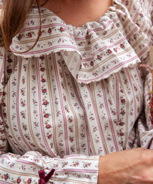 Beatrice Rose Stripe nightie close-up of the ruffled collar, floral stripe print and bow on the cuff