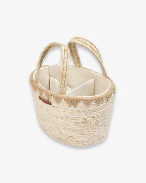Woven basket with handles on a white background