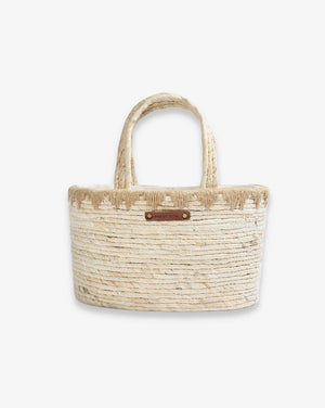 Woven handbag with a handle on a white background