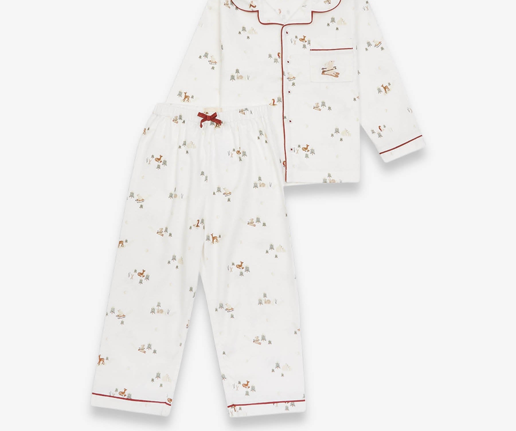 White baby onesie with red trim and small prints on a white background