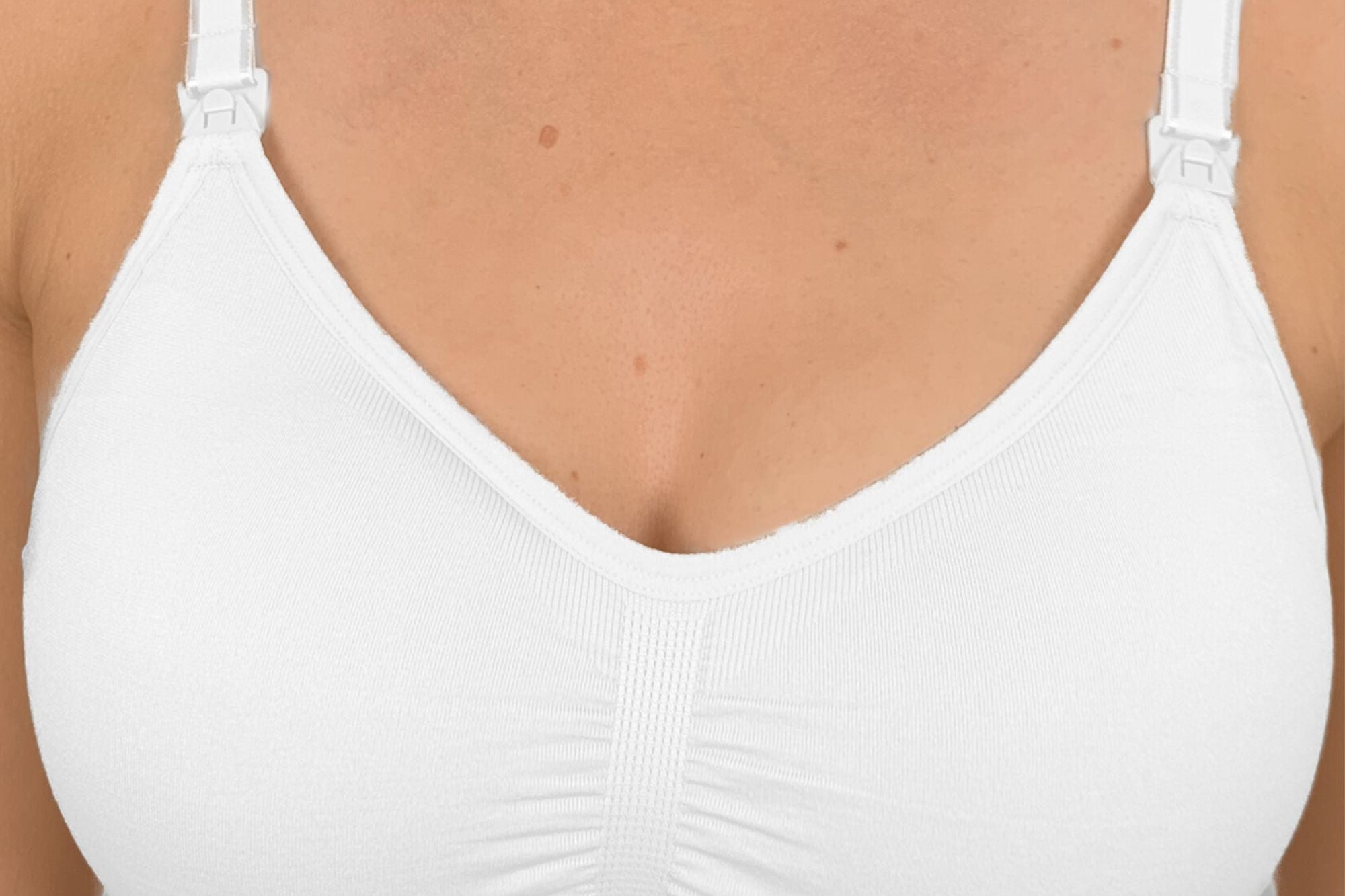 White bra on a gray background