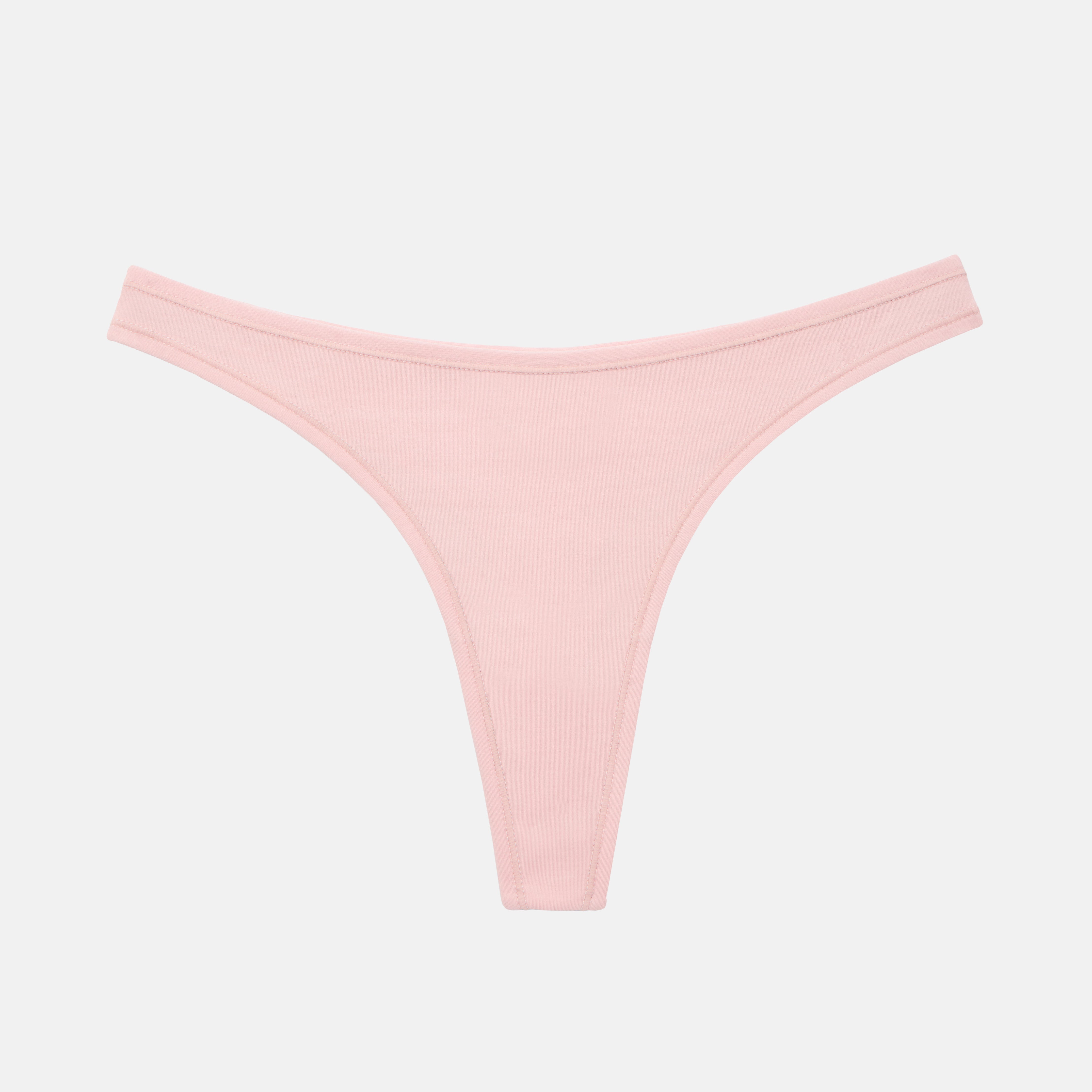 A light pink thong-style underwear bottom shown flat against a very light gray background.