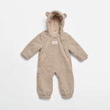 ALF Eco Pramsuit in beige, front view laid flat showing the hood with bear ears, diagonal zip and cuffed legs