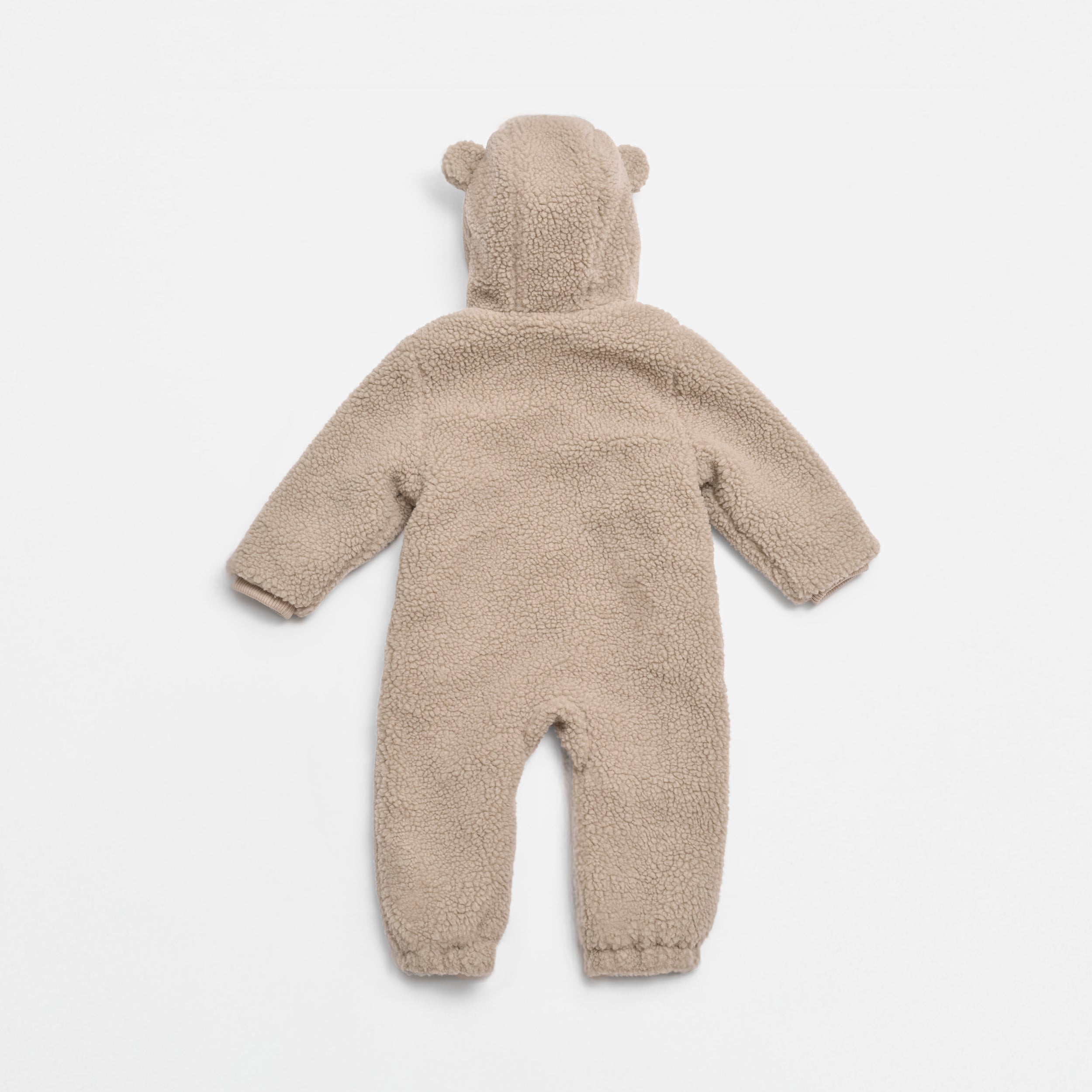 ALF Eco Pramsuit in beige, back view laid flat showing the plain back, hood with bear ears and cuffed legs